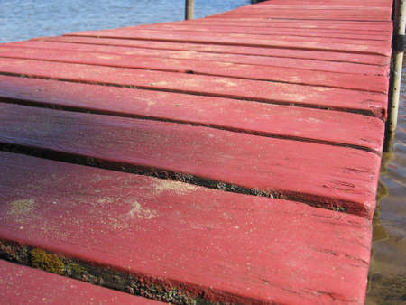 Close-up of red wooden dockの写真素材