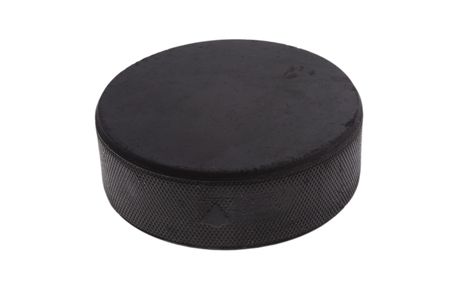 hockey puck isolated on white backgroundの写真素材