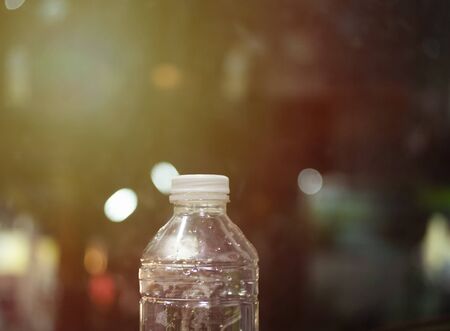 Plastic bottles on the background bokeh. Currently, there is so much garbage overflowing in the world.の写真素材