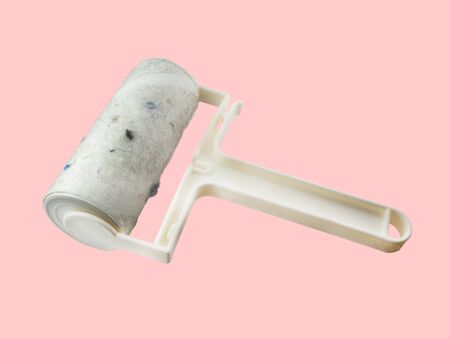 Roller dust on a pink background,with clipping pathの写真素材