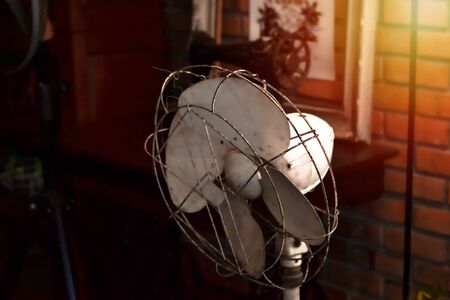 Old fans stand in one corner of the cafe. To think about the old days was a kid again.の写真素材