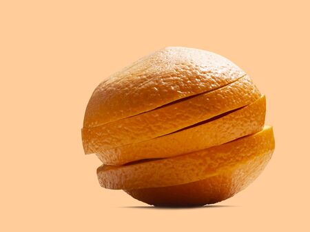 Orange ball that split down the middle On an orange background with clipping