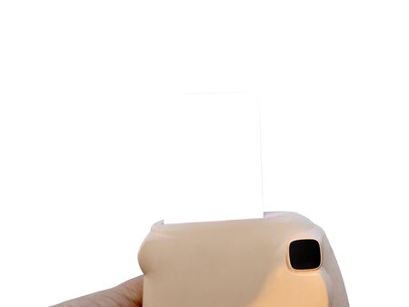 Polaroid pictures that are out of the Polaroid camera pink, white background, ready for recording memories and useの写真素材