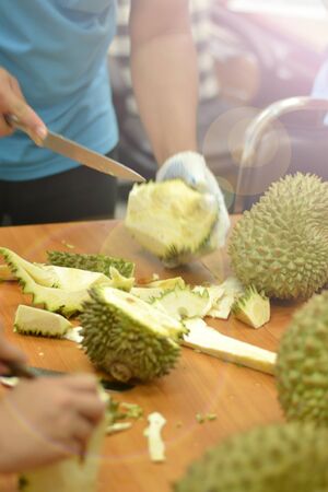 How to peel durianの写真素材