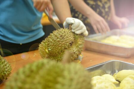 How to peel durianの写真素材