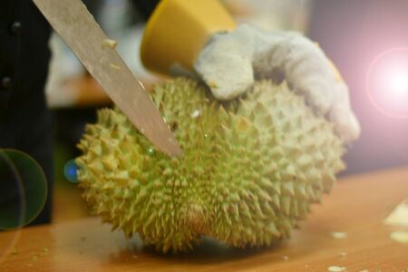 How to peel durianの写真素材