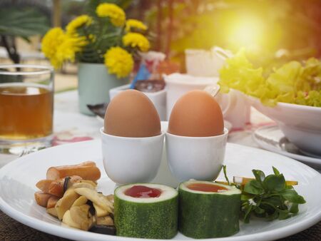 Boiled eggs and salad for breakfast, simple and healthy. It became a popular food for many people.の写真素材