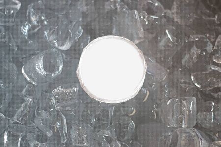 Plastic drinking cup Available in Ice As a result, ice cold look blurry.Plastic mug soak in a bucket...