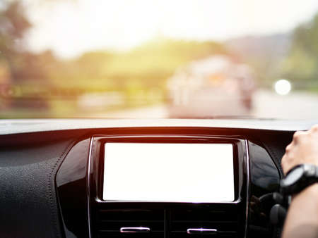 Inside the car is driving on a beautiful mountainous road