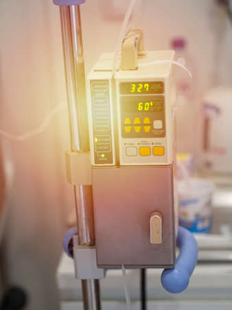 This infusion pump adjusts the drip volume of the saline to the appropriate amount, not too little or too little. Same, adjustable by hand and harmlessの写真素材