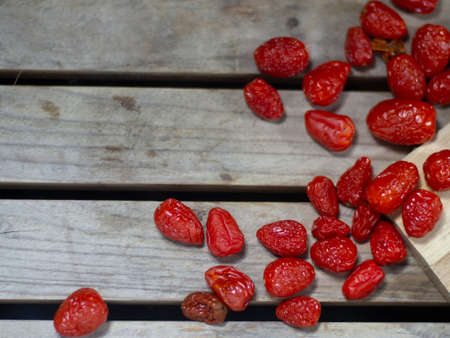 Dried Cherry Tomatoes On a dark wood background