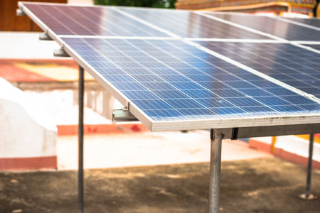 Large solar panels in the public space of a temple in Asia are mostly being used. to reduce costsの写真素材