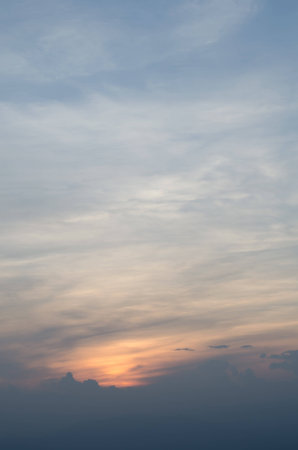 Sunset behind the cloudの写真素材