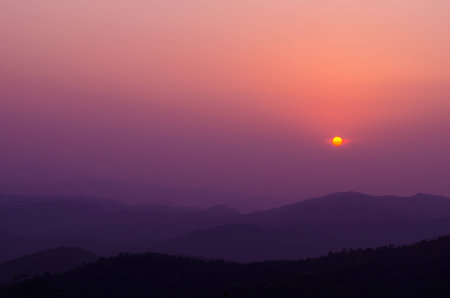 Sunset behind the cloudの写真素材
