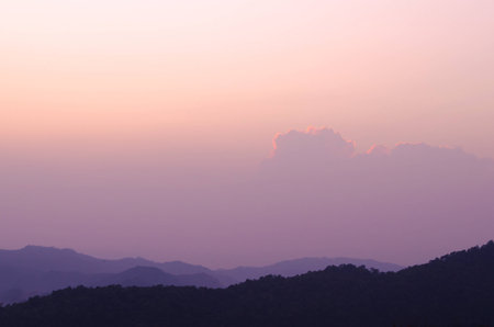 Sunset behind the cloudの写真素材