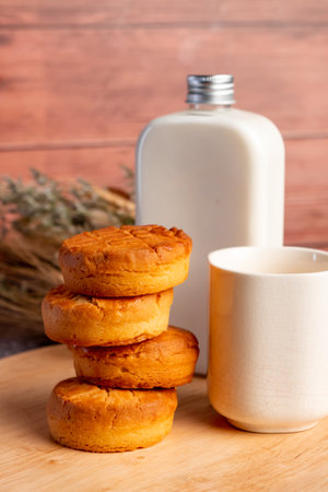 cookies and milk on a wooden background. style vintage. selective focusの写真素材