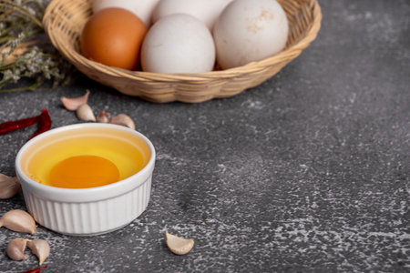 Ingredients for cooking chicken eggs on a gray background. Selective focus.の写真素材