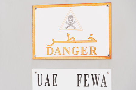 United Arab Emirates FEWA Danger sign for industrial electrical warning in English and Arabic.