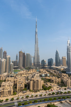 8/11/2020 - Dubai, United Arab Emirates: Iconic portrait shot of Burj Khalifa and Dubai Skyline during the day with and other skyscrapers in the Middle East with blue sky"のeditorial素材
