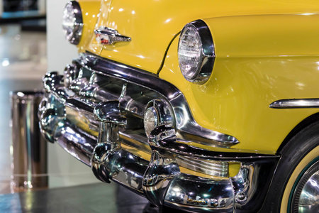 Classic American Yellow Car and chrome bumper from 1930s.の写真素材