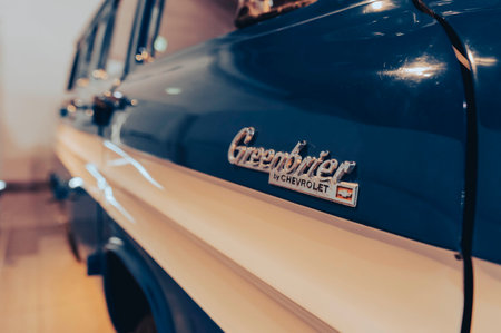 "7/31/2021 - Sharjah, UAE: 1962 Chevrolet (Chevy) Greenbrier American van with side logo to blurred defocused background"のeditorial素材
