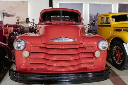 7/31/2021 - Sharjah, UAE: Front bumper of Pick up Truck Classic Chevrolet (Chevy) red American truck