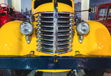 "7/31/2021 - Sharjah, UAE: Front bumper of Diamond T 404 Yellow American Classic Antique Pick up Truck.のeditorial素材