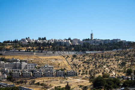 Buildings and houses on the Mount of Olives. Down the hill is the olive groveの写真素材