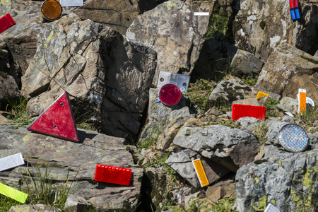 Cataphotes of different shapes and sizes are glued on stones in the Carpathian mountains (Ukraine, Carpathians, Dragobrat)の写真素材