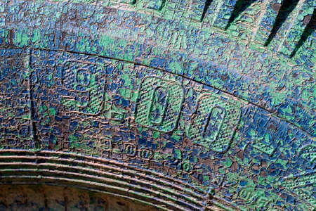 Texture of an old tire with cracked blue-green paintの写真素材