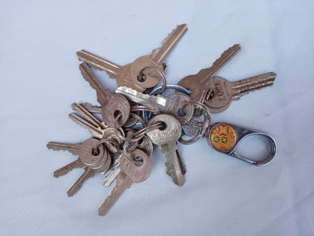 A group of keys on an isolated background