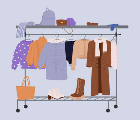 Stylish fashion clothes hanging on hangers on garment rack or rail. Fashion clothes and accessories on hanger rail. Fall, winter garments, footwear and bags. Women capsule wardrobe on racks.のイラスト素材
