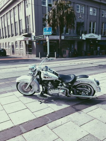 Big motorcycle park at road side の素材