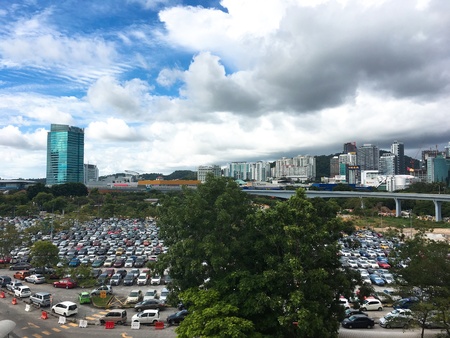 Blue cloudy weather with commercial buildingの素材