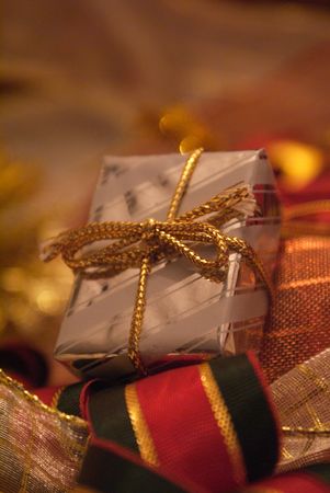 Christmas presents surrounded by seasonal ornaments with cute and powerful colors.の写真素材