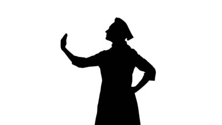 Portrait of black silhouette cook girl in toque is gesticulating praising their dishes on white background. Profile viewの写真素材