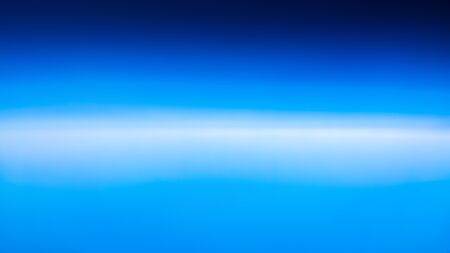 Beautiful aerial photo shot of the cloudscape, the clear blue sky above the clouds of the stratosphereの写真素材