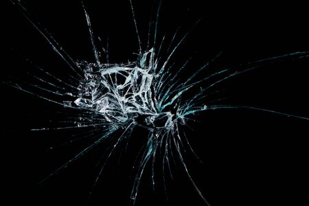 broken glass dark backgroundの写真素材