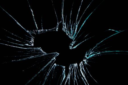 broken glass dark backgroundの写真素材