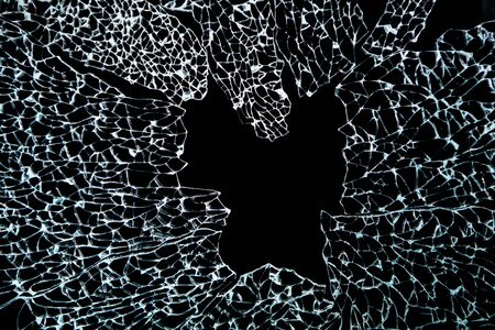 Close-up of Broken Glass, Shattered Tempered glass on Black Backgroundの写真素材