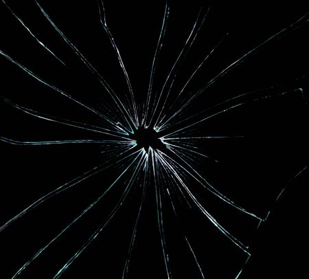 broken glass dark backgroundの写真素材