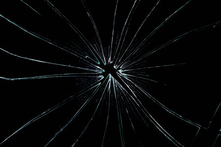 broken glass dark backgroundの写真素材