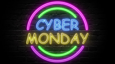 Neon glowing sign Cyber Monday on black brick wall. Computer graphics of electric luminous billboard, banner from blue yellow neon tubes. Neon signboard of sale shopping.の写真素材