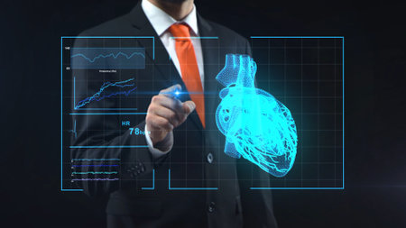 Man in black suit touching with a finger holographic interface with touch screen on technological medical digital monitor. Doctor looking on virtual hologram with heart. Diagnosis, treatment, researchの写真素材