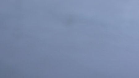 Beautiful monochrome clear gradient surface of water creating hypnotizing calming effect, wallpaper background.の写真素材