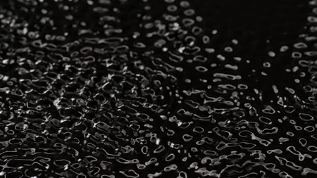 Beautiful black deep light water surface with circles and ripples, abstract background, wallpaper...