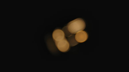 Abstract isolated blurred festive yellow orange lights with bokeh.