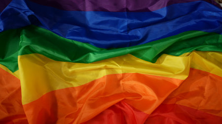 Top view shot of LGBT pride flag, six color rainbow flag background for your promotional clip, advertisement and creative content.の写真素材