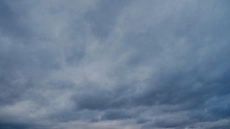 Light in the Dark and Dramatic Storm Clouds background
