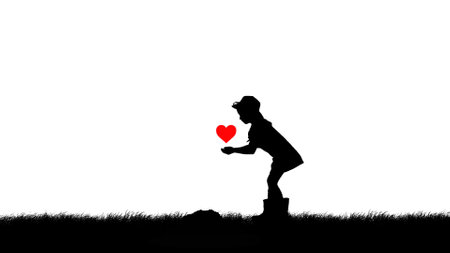 Portrait of person farmer isolated on white background with alpha channel. Black silhouette of girl gardener planting red heart into the soil.の写真素材